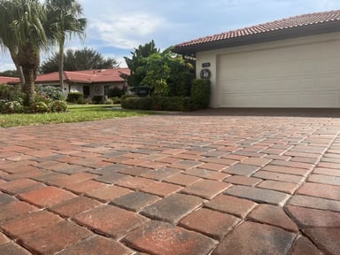 Completed brick paver driveway installation in Winter Haven, FL
