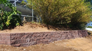 Retaining wall construction project by American Pavers