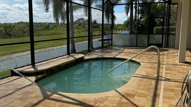 Pool deck pavers around custom pool, Polk County FL