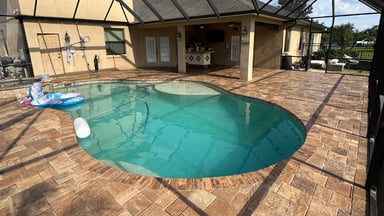 Completed pool deck paver project by American Pavers